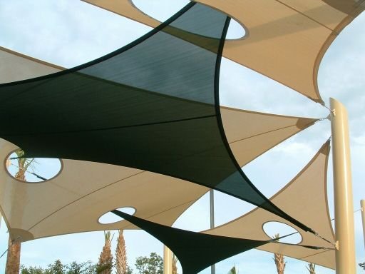 مظلات سيارات شد إنشائي في الرياض بتصاميم أنيقة وعملية